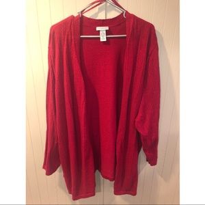 Red sparkly cardigan.
